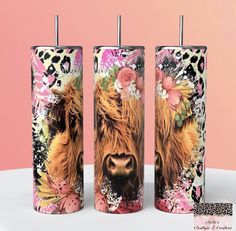 three vases with animals painted on them and one has flowers in its hair, while the other is wearing a flower crown