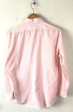 "-Description- >Mcgregor men's pink & white striped dress shirt >collared >button down >open pocket on the front >size 16 32/33 >so preppy! >condition: ok - a good amount of piling around the neck and under arms but still wearable >color(s): pink, white >fabric(s): 65 polyester / 35 cotton >brand: mcgregor >care: machine wash -Measurements- >size: 16 32/33 ✩ all measurements are taken with the item laying flat & some sizes are estimates so please check Pink Cotton Button-up Dress Shirt, Classic Pink Cotton Dress Shirt, Pink Cotton Tops With Spread Collar, Pink Cotton Top With Spread Collar, Classic Pink Cotton Shirt, Pink Cotton Dress Shirt With Spread Collar, Casual Pink Cotton Dress Shirt, Summer Pink Cotton Dress Shirt, Mens White Dress Shirt