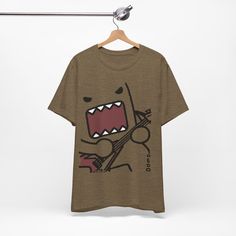 Vintage Emo Scene y2k Fashion Tshirt featuring an Unisex Electric Guitar Domo Kun design, reminiscent of 2000's Hot Topic style. This tee exudes nostalgia and edginess, perfect for casual wear or as a statement piece. Ideal for fans of vintage cartoons and alternative fashion. Product features - Vintage Emo Scene y2k Fashion - Unisex Electric Guitar Domo Kun Design - Made with 100% Airlume combed and ring-spun cotton - Retail fit for casual and semi-formal settings - Manufactured in a humane, su Short Sleeve Shirt With Logo For Concert, Y2k Graphic T-shirt With Relaxed Fit, Graphic Print Short Sleeve Shirt For Concert, Casual Logo Print Shirt For Concert, Casual Concert Shirt With Logo Print, Casual Graphic Print T-shirt For Concerts, Crew Neck Concert Shirt With Screen Print, Unisex Graffiti Print Crew Neck T-shirt, Retro Graffiti Print Tops For Concert