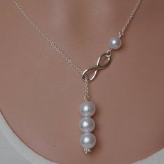 Silver Karma circle necklacePearl string NecklaceY | Etsy Bridesmaid Pearl Necklace, Necklace Infinity, Pearl Lariat Necklace, Pearl Lariat, Pearl Drop Necklace, Bridesmaid Pearls, Infinity Jewelry, Pearl Necklace Set, Long Silver Necklace