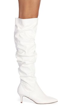 Step up your boot game with these one of a kind beauties! They feature a just below the knee fit. a slouched body. an inner zipper closure. a pointed toe and a low stiletto heel. Boots are composed of a white hued faux leather material. Fitted High Ankle White Heeled Boots, Chic White Heeled Boots With Wide Calf, Fitted White High Ankle Heeled Boots, Chic White Wide Calf Heeled Boots, Trendy White Mid-calf Boots For Party, Chic White Boots With Wide Calf, White Fitted High Ankle Heeled Boots, Chic White Wide Calf Boots, White Wide Calf Boots For Party