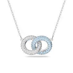 Express yourself with this dazzling pendant necklace from Swarovski Crystal. Featuring interlocking circles in clear and aquamarine pave, it is finished with a sleek rhodium-plated setting. Layer yours with other designs from the Stone family for easy elegance. Measurements: Chain measures 14 7/8 inches in length while the pendant measures 1/2 of an inch in length by 3/4 of an inch in width Swarovski Crystal Style #: 5642883