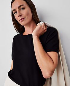 Elevate your wardrobe with the Ann Taylor Petite Sweater T-Shirt, a perfect blend of comfort and chic style. This fitted piece is designed specifically for petite frames, ensuring a flattering fit for smaller proportions.

- Size: Petite 2XS
- Color: Classic Black
- Material: 62% Viscose, 38% Nylon
- Gender: Women's
- Length: 23 1/2" long
- Features: Crew neck, short sleeves, ribbed neckline, cuffs, and hem
- Care Instructions: Machine washable

Ideal for both solo wear and layering, this sweate Black Cashmere Sweater, Petite Sweaters, Knitted Suit, Ribbed Neckline, Petite Women, Fitted Sweater, Light Weight Sweater, Sweater And Shorts, Ann Taylor