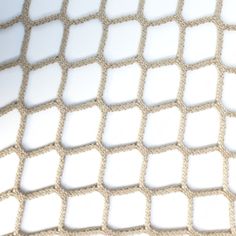 a close up view of a white net