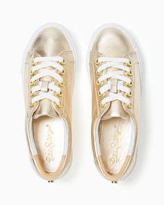 Leather lace up sneaker with gold metallic and pave rhinestone accents. Solid Nappa Leather. Imported. Step into the sunshine with our Hallie Sneakers, a goes-with-everything pair    made from white leather with gold metallic details and rhinestone accents. Leather Lace, The Sunshine, Nappa Leather, Leather And Lace, White Leather, Lilly Pulitzer, Gold Metal, Lace Up, Sneakers