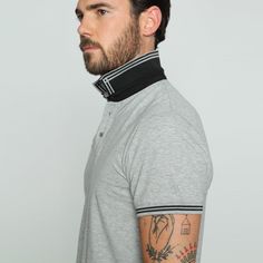 This may be your new favorite polo. Hand-crafted from super-soft Pima cotton in our signature Slim Fit, it’s breathable, flattering, and made to last. You’ll also love the double-sided, woven collar: the contrasting design on the reverse lets you change up your look with a simple flip. Slim Fit Runs Small Made in Turkey 95% Cotton 5% Spandex Machine Washable Style #T-7006 Gray Fitted Polo Collar Top, Fitted Gray Polo Collar Top, Gray Fitted Polo Collar T-shirt, Fitted Gray Polo Collar T-shirt, Classic Gray Cotton Polo Shirt, Gray Short Sleeve Sporty Polo Shirt, Gray Relaxed Fit Cotton Polo Shirt, Gray Sporty Short Sleeve Polo Shirt, Gray Sporty Top With Ribbed Collar