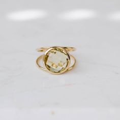 Lemon Quartz ring with double band in 14K solid gold. A modern and timeless stone ring with a natural quartz gemstone. A perfect gem gold ring for women, dainty and subtle that adds glam to every outfit. The best for her. 100% handcrafted with love!D E T A I L S● Metal: 14K solid gold or 14K white gold or 14K rose gold● Gemstone: Lemon Quartz, briolette cut● Stone Diameter: 10mm (0.4in) or 12mm (0.5in)R I N G ∙ S I Z I N GFor General Reference:● we use standard US Ring Sizing● an average women's Modern Gold Crystal Ring With Gemstone, Modern Gold Stackable Rings With Gemstones, Modern Gold Stackable Gemstone Rings, Modern Stackable Gold Rings With Gemstones, Modern Gold Birthstone Ring With Gemstone, Modern Gold Gemstone Birthstone Ring, Modern May Birthstone Ring, Modern Gold Citrine Rings, Modern Gold Stackable Rings With Birthstones