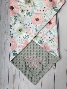 the personalized bandana has pink flowers on it