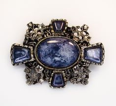 "Unique & Rare" Vintage hand crafted sodalite ornate brooch. This piece is stunning and beautiful with a gothic mystical vibe. You will receive: (What you see in the images) - 1 Sodalite brooch: 2 1/4" X 1 3/4" inches Contact me through Etsy messaging with any questions. All vintage items are hand picked for quality and uniqueness, so you can feel special wearing an authentic piece of the past. Thanks for shopping at Rose & Lily's, check back often for new vintage treasures. Antique Handmade Blue Brooches, Vintage Sapphire Brooches For Gifts, Vintage Sapphire Brooches As Gift, Rare Jewelry, Rose Lily, Jewelry Blue, Spiritual Jewelry, Purse Jewelry, Vintage Bracelets