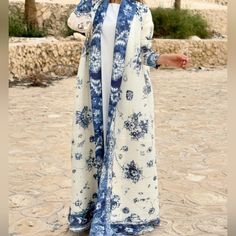 New! Current 2024 Season Beautiful Blue And Cream Floral Porcelain Pattern Long Kimono Jacket Abaya Maxi Duster Cardigan Jacket With Matching Tie Belt One Size - Will Fit Medium, Large And Xl Meant To Be Fashionably Loose But Best On A Large Or Xl Pleated Stretchy Fabric, Very Versatile From Dubai Designer Moonray Perfect For Any Season! Floor Or Ankle Length If You're Between 5'5" And 5'8" Sold Out 4 Times! Cost About $200 With Shipping, Get This For A Deal! Machine Washable, No Other Tags Or L White Bohemian Abaya For Spring, White Long Sleeve Abaya For Spring, Casual Winter Abaya, White Spring Abaya, Jacket Abaya, Casual Long Blue Abaya, Long Flowy Blue Kimono, Spring Blue Long Sleeve Abaya, Blue Long Sleeve Kimono With Floral Print