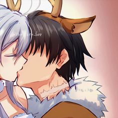 two anime characters kissing each other with horns on their heads and one has his eyes closed