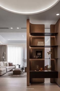 a modern living room with shelves and couches