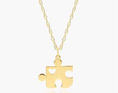 14K Yellow Gold Puzzle Necklace. This necklace is the missing piece to your accessory collection. Stylish and chic in glimmering gold, you're going to love every second this adorns your neck. Puzzle Necklace, The Missing Piece, Missing Piece, The Missing, Rope Chain, Spring Rings, Precious Metals, Gold Necklace, Fine Jewelry