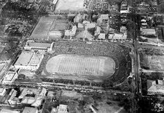 an aerial view of a football stadium and surrounding buildings