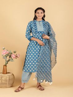 Blue Floral Printed Embroidered Yoke Kurta Set (Set of 3) By Shemohe now available at Trendroots Cotton Kurta With Block Print And 3/4 Sleeve, Spring Indigo Cotton Kurta, Fitted Cotton Kurta With 3/4 Sleeves, Indigo Block Print Straight Kurta, Festive Cotton Kurta With Printed Motifs, Spring Embroidered Blue Anarkali Set, Indigo Cotton Straight Kurta, Spring Block Print Chanderi Salwar Kameez, Spring Cotton Kurta With Block Print