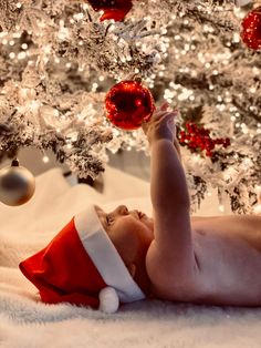 Baby at Christmas Babies Christmas Photos, 6 Month Baby Christmas Picture Ideas, At Home Baby Christmas Photoshoot, One Month Picture Ideas, 5 Month Old Christmas Photos, Newborn And Toddler Christmas Pictures, Diy Newborn Christmas Pictures, Baby Under Christmas Tree Photo, 2 Month Old Christmas Photos