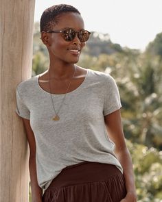 This tee shirt is a show of seasonless simplicity in a soft blend of organic pima cotton and TENCEL jersey with a touch of shape-retaining spandex. Slightly relaxed fit. Scoop neckline. Short sleeves. Low-hip length. Organic pima cotton/TENCEL lyocell/spandex. By Garnet Hill. Garnet Hill, Pima Cotton, Hip Length, Tee Shop, Scoop Neckline, Knit Top, Garnet, Tee Shirt, Short Sleeve Tee