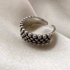 ⭐ THIS ITEM AUTOMATICALLY INCLUDES A FREE RING CASE HOLDER TO STORE OR GIFT THIS ITEM ⭐ * Silver Chunky Ring, Silver Ring, Stackable Adjustable Open Ring, Statement Ring, Unisex Ring * A beautiful, open back style silver ring - The Material Is An Alloy Base With Silver Plating * All orders are shipped within 48 hours * Lovingly packaged inside a giftbag - If you would like a gift message with your chosen item, this is possible * Many unique styles listed in my shop * Changed your mind? - No prob Silver Open Dome Ring Stackable, Silver Stackable Dome Ring With Open Shape, Adjustable Stackable Dome Ring, Trendy Silver Toe Ring, Adjustable Silver Dome Ring, Adjustable Silver Stackable Wide Band Ring, Vintage Silver Open Midi Rings, Handmade Adjustable Silver Dome Ring, Silver Adjustable Dome Ring