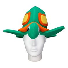 a green and orange hat on top of a head