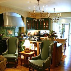 an image of a living room and kitchen in the same photo, taken on instagram