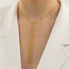 Complement your evening look with this amazing cascading waterfall necklace plated with yellow gold. Chain length 40+5 cm Drop 12 cm 14k Gold plated We use a high-quality proprietary gold plating technology for each piece. CARE INSTRUCTIONS Protect your jewelry and its plating by removing it while swimming, showering, exercising, washing your hands, or applying any products such as perfumes, lotions, or hair products. We pride ourselves on the quality of our product; however, if your jewelry sho Long Drop Necklace, Waterfall Necklace, New Gold Jewellery Designs, Layered Chain, Necklace Layered, Layered Chains, Necklace Long, Yellow Gold Chain, Gold Jewellery Design