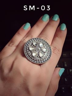 Add a hint of flamboyance to your outfit with these intricately designed and handcrafted rings in antique silver look .Rings are adjustable so can fit any size comfortably SM-01 & SM-02 diameter 2 inches Weight 15 GM's approx SM-03 ,SM-04 ,SM-05 ,SM-06 ,SM-07 Diameter 1 inches Weight 10 GM's approx Note: All in stock items will be shipped from New Delhi, India within 2-3 business days after receipt of payment. International orders may take anytime between 3 to 5weeks for your shipments to re Antique Silver Rings With Oxidized Finish, Oxidised Rings Indian, Traditional Silver Meenakari Rings, Adjustable Bohemian Antique Silver Ring, Bohemian Nickel-free Antique Silver Ring, Traditional Indian Jewellery, New Delhi India, Celebrity Engagement Rings, Kundan Earrings