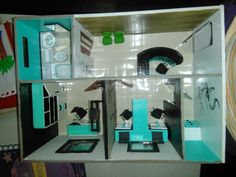 a doll house with furniture and accessories in it