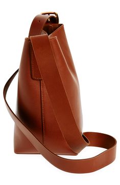 Madewell's newest leather bag collection is cool, modern and quietly luxe. With a magnetic closure and interior pocket, the mini bucket tote is perfectly sized to hold your phone, wallet, keys and more—plus, it has a shoulder strap and adjustable crossbody strap. It's so good, it's essential. Structured silhouette with flat base for stability Leather Imported Bucket Tote, Bucket Handbags, Mini Bucket, Bag Collection, Leather Bucket Bag, Phone Wallet, Crossbody Strap, Magnetic Closure, Bucket Bag