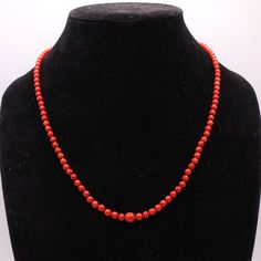 Discover the exquisite beauty of this antique graduated natural red Mediterranean coral necklace. The vibrancy of the red coral beads that range from 3.5mm to 7.2mm in size is simply breathtaking. The necklace is adorned with a 10K yellow gold box clasp which features a 5mm coral cabochon that adds to its elegance. With its 21-inch length and weight of 16.2 grams, this necklace will perfectly complement any outfit, adding a touch of sophistication to your look. This necklace is in excellent cond Classic Red Gemstone Beads Necklace, Classic Red Necklace With Gemstone Beads, Formal Red Coral Beaded Necklace, Classic Red Single Strand Beaded Necklace, Classic Red Hand-strung Necklaces, Classic Red Round Beaded Necklaces, Classic Red Single Strand Necklace, Coral Beads Necklace, North Myrtle Beach