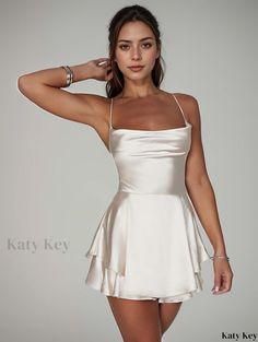 Katykey - Sophisticated Womens Backless Spaghetti Strap Tiered Dress with Stylish Cowl Neck Detail, A-line Design - Classic Mini Dress for the Modern Woman Elegant Backless Suspender Dress For Brunch, Party Sundress With Square Neck, Elegant Strappy Back Mini Dress For Summer, Elegant Cami Mini Dress For Summer, Elegant A-line Suspender Dress For Brunch, Elegant Cami Suspender Dress For Date Night, Elegant Cami Mini Dress For Brunch, Elegant Fitted Suspender Dress For Brunch, Elegant Lined Dress With Strappy Back