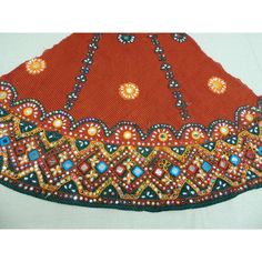 Vintage Indian embroidered skirt With inset, mirrors, beads, sequins and with a seersucker linen as ground textile India. 1980's Moorish style Hand made Size: 42 W x 22 H x 12" top. Traditional Sequined Skirt For Festive Occasions, Embellished Skirt For Party And Festivals, Festive Embellished Skirt For Festivals, Traditional Festive Skirt With Mirror Work, Traditional Embellished Festive Skirt, Traditional Party Skirt With Mirror Work, Traditional Embroidered Skirt For Festivals, Traditional Embroidered Festival Skirt, Traditional Skirt With Mirror Work For Navratri