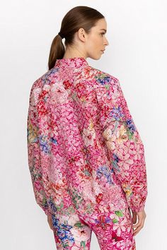 Embellished with a bold floral pattern, the Frame Eyelet Full Zip Jacket perfectly combines style and performance wear. Crafted from a lightweight material with a hint of stretch, this colorful jacket features a full zip front and zippered pockets and is finished with elastic at the wrists and hemline. Pair with the Frame Cross Back Eyelet Sports Bra and classic leggings for a gym-ready look. Johnny Was Women's Bee Active Eyelet Sporty Zip Jacket in Frame Pink, Size XL, Floral Colorful Jacket, Frame Pink, Boho Chic Outfits, Women's Blouses, Performance Wear, The Bee, Chic Outfit, Embroidered Jeans, In Frame