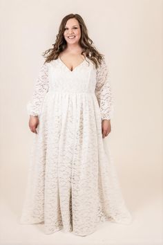 The Rue Gown is perfect for the boho bride. This gown features: V neckline and back made from soft boho-inspired lace, lined with matte satin with supportive boning Flowy, gathered skirt made from soft boho-inspired lace, lined with a matte satin a-line circle skirt Optional fitted sleeves or bishop sleeves with elastic cuffs, available as detachable or permanently attached sleeves Optional small train Center back zipper closure or optional corset back Customize this dress to make it yours by ch V-neck Lace Gown With Lace Trim, V-neck Gown With Lace Bodice, Lace Gown With Fitted Bodice And V-neck, Bridesmaid Lace Gown With Lace Back, Lace Gown With Scalloped Lace And Sweetheart Neckline, Fitted Lace Maxi Dress With Lace Back, Flowy Lace Top Dress For Wedding, Flowy Lace Top Wedding Dress, Bridesmaid Lace Maxi Dress With Lace Trim