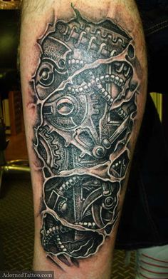 a man's leg with a tattoo on it