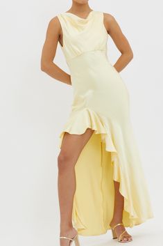 Butter dress Partially lined Cowl back High split with ruffle trim Tied back Zipper in back Make your grand entrance in our gorgeous Maridon dress. It features a cowl neckline and thigh-high split with a ruffle trim. It's perfect for a big birthday celebration or special event. Team it with nude heels and a clutch for a head-turning look we are loving. MODEL INFO Model is wearing size XS Height: 5'7" Bust: 32.0" Waist: 24.0" Hips: 33.0" CARE Hand Wash Cold. Do Not Iron. MATERIAL POLYESTER Purple Bridesmaids, Yellow Bridesmaids, Red Bridesmaids, Blue Bridesmaids, Iron Material, Cowl Neckline, Date Night Dresses, Dress Satin, Grand Entrance