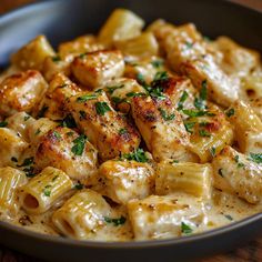 Creamy Parmesan Chicken with Rigatoni Pasta is a simple and tasty dish that everyone will love. It’s quick to prepare and has creamy, cheesy goodness in every bite. This meal is perfect for busy weeknights or any family gathering. Why Make This Recipe This recipe is easy to make and packed with flavor. The combination Meals With Rigatoni Noodles, Pasta Dinners With Chicken, Marry Me Chicken Rigatoni, Rigatoni And Chicken Recipes, Christmas Pasta Bar, Rigatoni Recipes Baked, Corkscrew Pasta Recipes, Chicken And Risotto Recipes, Creamy Rigatoni Recipes