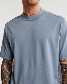 Our new short-sleeve tee in our softAF 180g fabric and vintage oversized-fit silhouette, featuring reverse seaming details, crew neckline and straight hem. Made in the same fabric as our Essential Tee but fits like our Premium Heavyweight Tee! Relaxed Fit Washed Blue T-shirt, Oversized Short Sleeve T-shirt With Ribbed Neckline, Washed Blue Relaxed Fit Short Sleeve Tops, Casual Washed Blue Relaxed Fit T-shirt, Relaxed Fit Short Sleeve T-shirt For Casual Gatherings, Modern Relaxed Fit Top For Casual Gatherings, Washed Blue Relaxed Fit Crew Neck T-shirt, Blue T-shirt With Ribbed Crew Neck, Washed Blue Relaxed Fit Short Sleeve T-shirt