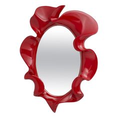 a red mirror is shown against a white background and it looks like an art object