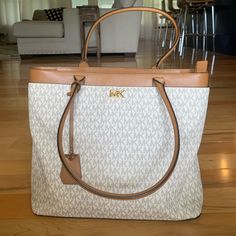 Authentic-Purchased From Michael Kors In December 2018. Very Clean. No Visible Imperfections. Beautiful Purse With Lots Of Storage Areas And Dividers. White Monogram Canvas Shoulder Bag For Everyday Use, White Monogram Canvas Shopping Bag, Everyday White Monogram Canvas Bag, White Monogram Canvas Shoulder Bag With Branded Hardware, White Monogram Canvas Shoulder Bag With Double Handle, Everyday White Monogram Canvas Shoulder Bag, White Monogram Canvas Bag For Everyday, White Monogram Canvas Bags For Everyday Use, White Monogram Canvas Tote Bag