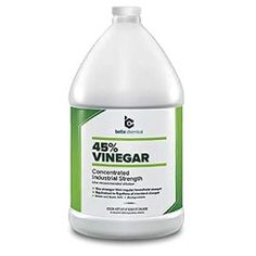 a gallon of vinegar cleaner on a white background