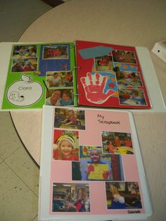 two binders with pictures and hand prints on them