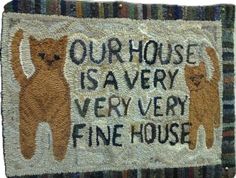 a door mat with cats on it that says our house is very very fine house