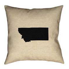 a black and white pillow with the shape of indiana on it's front side