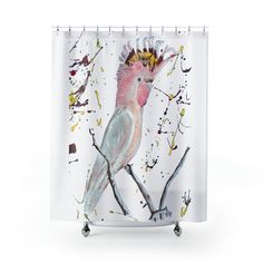 a shower curtain with a bird painted on it