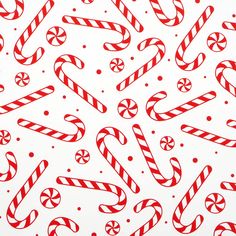 red and white candy canes on a white background