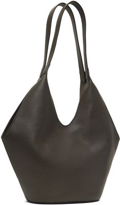 Grained calfskin tote in brown. · Fixed twin shoulder straps · Logo embossed at face · Magnetic closure · Card slot at interior · Faille lining · H8 x W15 x D5.5 · Total height: H20 Supplier color: Grain chestnut Elegant Brown Textured Leather Hobo Bag, Chic Leather-backed Business Shoulder Bag, Formal Textured Leather Tote Hobo Bag, Formal Textured Leather Hobo Tote Bag, Elegant Textured Leather Hobo Bag For Business, Elegant Leather-backed Hobo Bag For Travel, Elegant Hobo Bag With Leather Backing For Travel, Elegant Travel Hobo Bag With Leather Backing, Bucket Tote