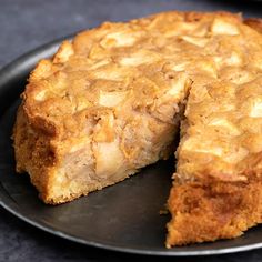 a pie on a plate with one slice cut out