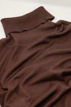 Introducing our Fine Knit High Neck Jumper in a warm and earthy brown shade – a testament to comfort and timeless style. This super-comfortable high neck sweater is delicately crafted in a very fine knit, ensuring a luxurious feel that's perfect for any occasion. The standard fit and rib detailing at the neck add a touch of refinement to this wardrobe essential.  Versatility meets sophistication as you can effortlessly pair this jumper with jeans or skirts, making it the go-to basic piece for your closet. The turtleneck neckline exudes elegance and warmth, while the long sleeves and bodycon fit contribute to a stylish and flattering silhouette.  Designed for daily wear, this Fine Knit High Neck Jumper seamlessly blends comfort with fashion. The fine knit composition, featuring 48% Viscose, High Neck Jumper, Fitted Jumper, Brown Shade, High Neck Sweater, Brown Shades, Knitwear Tops, Fit Style, Medium Brown, Daily Fashion