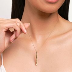 This classic nameplate style pendant necklace from the Juliette Maison collection features an engravable name or word of your choice (up to 8 upper-case letters), hugged by two dainty round diamonds. Wear it as a statement or expression of love for a person or place you want to keep close to you always. Fashioned in 10K yellow gold, the 18-inch chain secures in place with a lobster clasp. This necklace may be personalized with 1 to 8 letters. Classic Engraved Name Necklace Pendant, Classic Engraved Pendant Name Necklace, Classic Engraved Name Pendant Necklace, Gold Nameplate Necklace With Engraving Option, 14k Gold Nameplate Necklace With Engraving Option, Elegant Nameplate Necklace With Engraving Option, Engraved Yellow Gold Birthstone Pendant Necklace, Elegant Name Jewelry For Keepsake, Elegant Yellow Gold Jewelry With Engraved Text