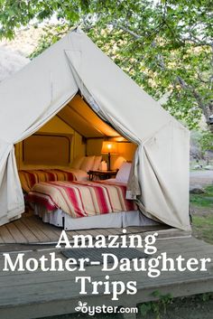 a tent with the words amazing mother - daughter trips written on it and an image of a bed inside